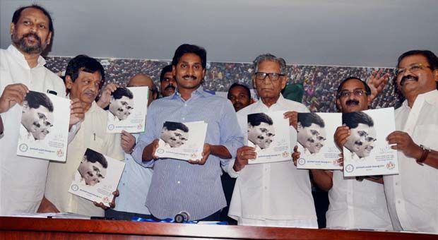 File photo of YSRCP President Y S Jagan Mohan Reddy with his party members (Photo: PTI) File photo of YSRCP President Y S Jagan Mohan Reddy with his party members (Photo: PTI)